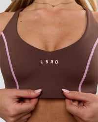 Woman wearing Stellar Sports Bra - Hot Chocolate-Pink Rose | Model:Issy | Size:XS | Thumbnail Index: 5