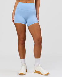 Woman wearing Strong is Beautiful Fusion High-Rise 4" Short - Open Air | Model:Issy | Size:XS | Thumbnail Index: 5