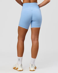 Woman wearing Strong is Beautiful Fusion High-Rise 6" Short - Open Air | Model:Issy | Size:XS | Thumbnail Index: 9