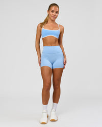 Woman wearing Strong is Beautiful Sports Bra - Open Air-White | Model:Issy | Size:XS | Thumbnail Index: 9
