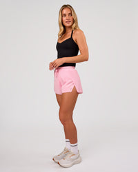 Woman wearing Unleash Shelf Bra Tank - Black | Model:Issy | Size:XS | Thumbnail Index: 3