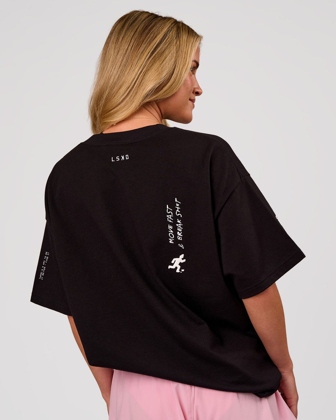 Woman wearing Values Manifesto Heavyweight Oversized Tee  - Black-White | Model:Issy | Size:XS - view 6