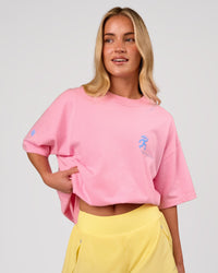 Woman wearing Values Manifesto Heavyweight Oversized Tee  - Pink Rose-Open Air | Model:Issy | Size:XS | Thumbnail Index: 5