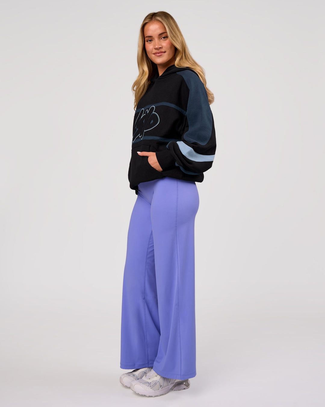 Woman wearing Vibe Oversized Hoodie - Black-Future Navy | Model:Issy | Size:XS - view 10