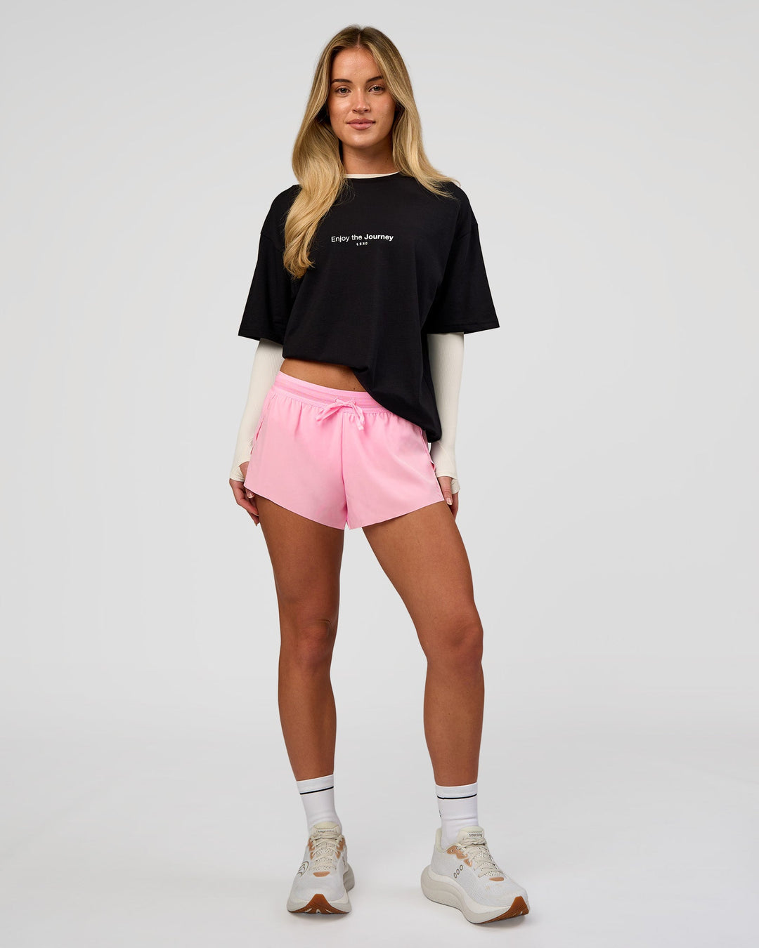 Woman wearing VS1 Enjoy The Journey FLXCotton Oversize Tee - Black | Model:Issy | Size:XS - view 9
