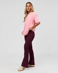 Woman wearing VS1 Enjoy The Journey FLXCotton Oversize Tee - Pink Rose | Model:Issy | Size:XS | Thumbnail Index: 9