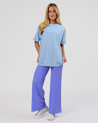 Woman wearing VS26 Journey FLXCotton Oversize Tee - Open Air-Lemon | Model:Issy | Size:XS | Thumbnail Index: 9