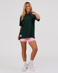 Woman wearing VS26 MFBS FLXCotton Oversize Tee - Midnight Green-Pink Rose | Model:Issy | Size:XS | Thumbnail Index: 5