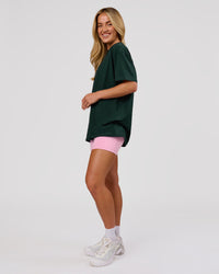 Woman wearing VS26 MFBS FLXCotton Oversize Tee - Midnight Green-Pink Rose | Model:Issy | Size:XS | Thumbnail Index: 12