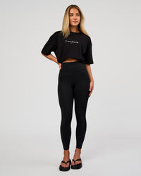 Woman wearing VS6 1% Better FLXCotton Oversize Tee - Black | Model:Issy | Size:XS | Thumbnail Index: 5