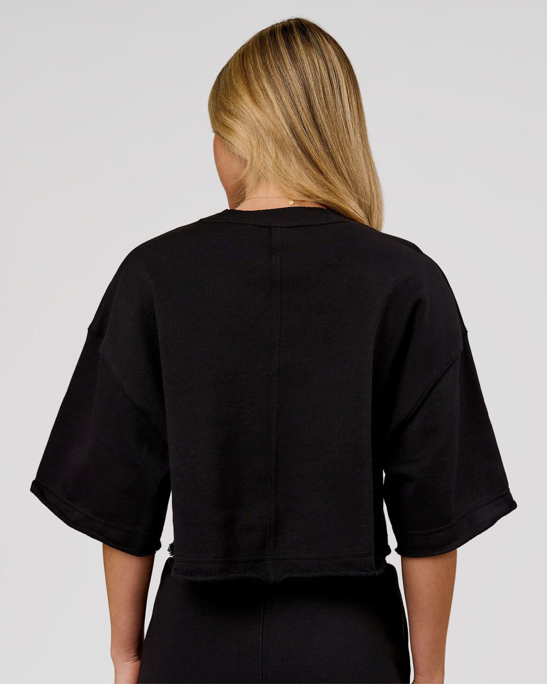 Woman wearing Go-To Terry Oversized Tee - Black | Model:Issy | Size:XS - view 4