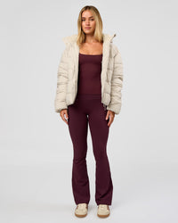 Woman wearing Go-To Puffer Jacket - Shale Beige | Model:Izzy | Size:XS