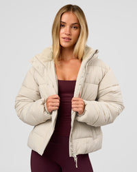Woman wearing Go-To Puffer Jacket - Shale Beige | Model:Izzy | Size:XS