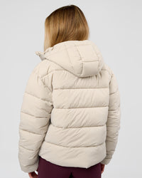 Woman wearing Go-To Puffer Jacket - Shale Beige | Model:Izzy | Size:XS