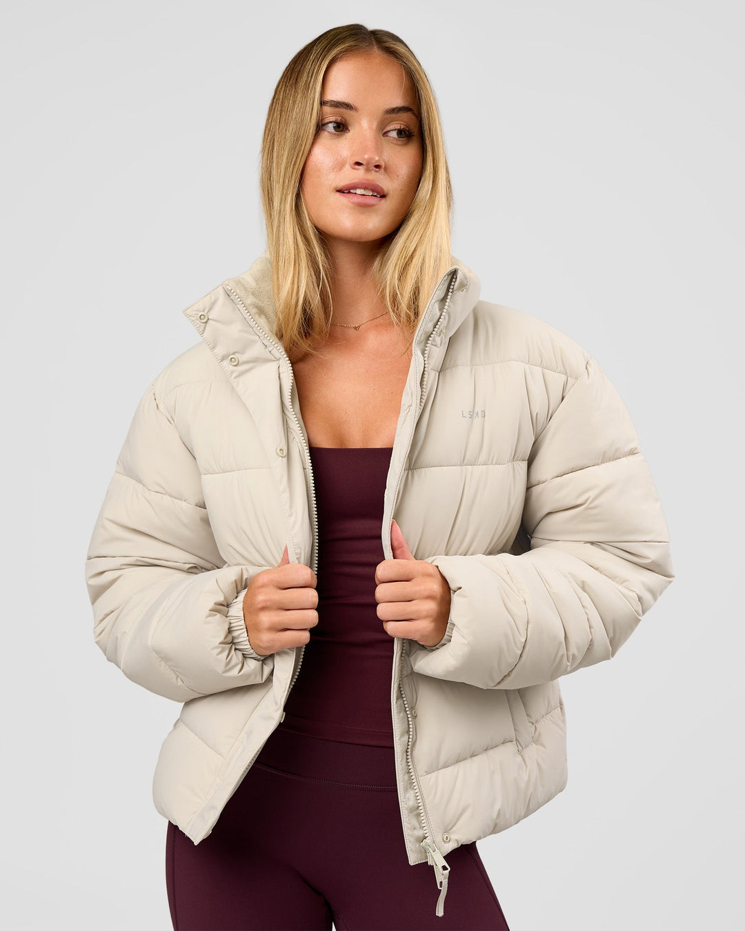Woman wearing Go-To Puffer Jacket - Shale Beige | Model:Izzy | Size:XS