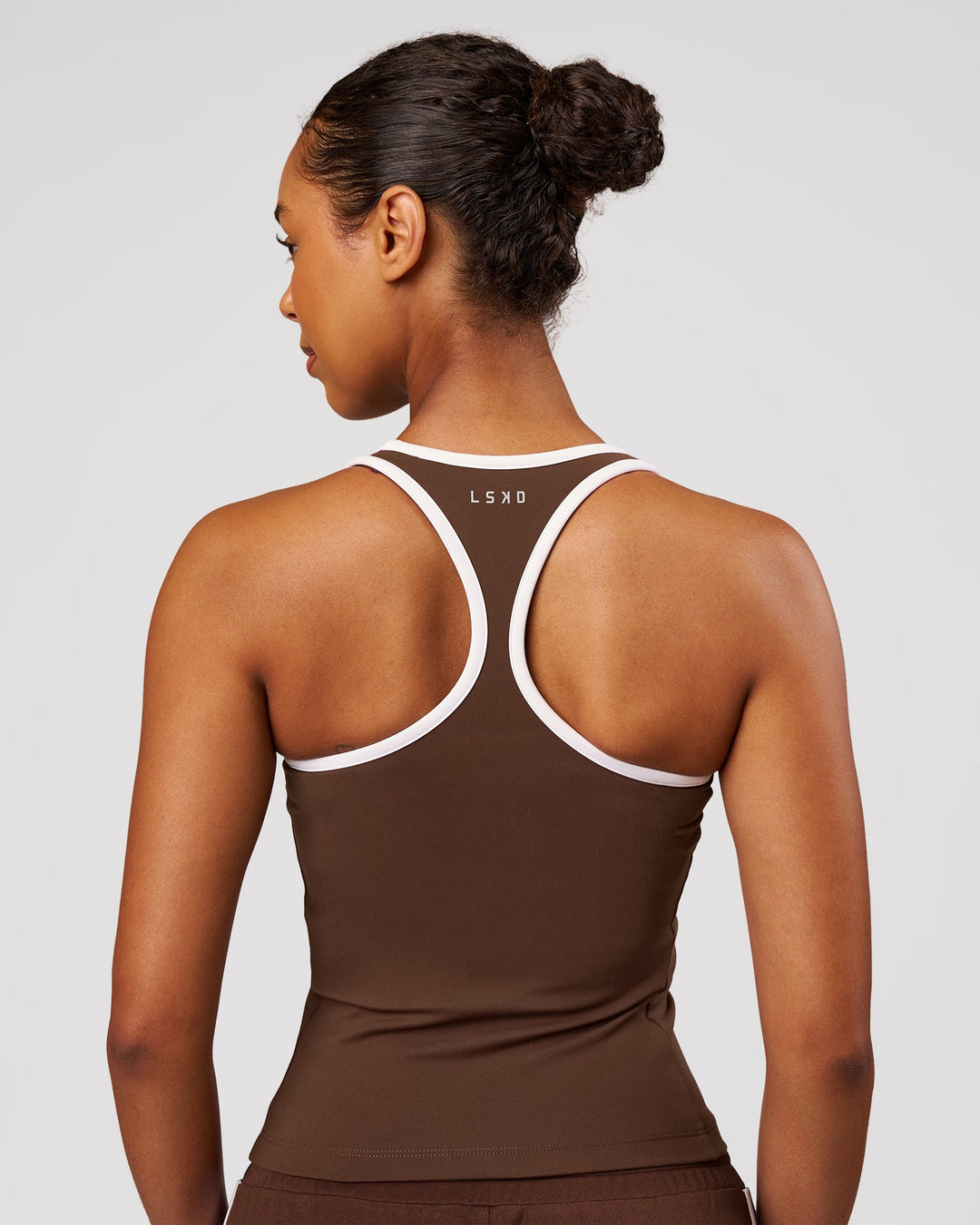 Woman wearing Flow Rep Scoop Neck Tank - Hot Chocolate-White | Model:Jordan | Size:XS - view 3