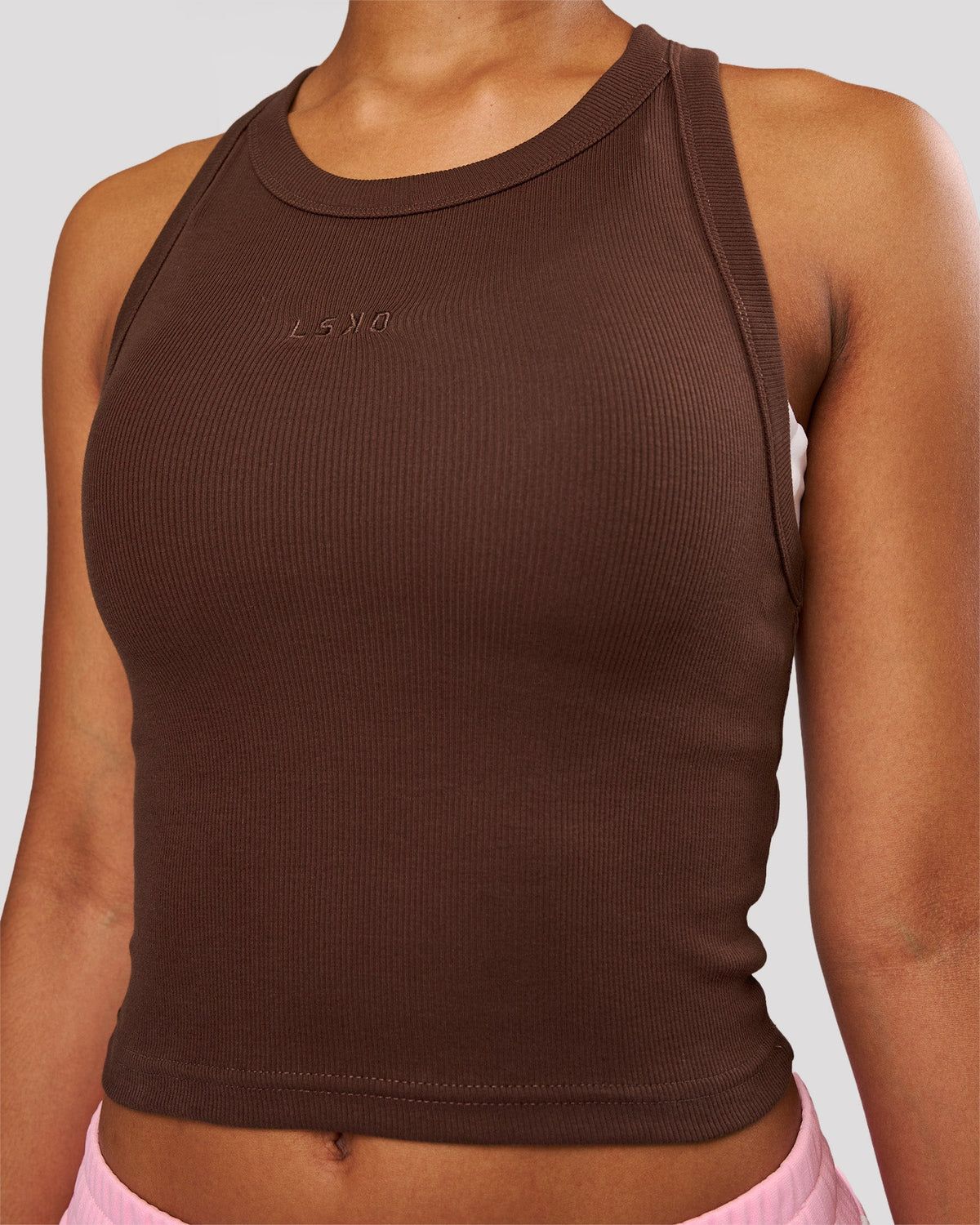 Woman wearing Go-To FLXCotton Rib Crop Tank - Hot Chocolate | Model:Jordan | Size:XS - view 1
