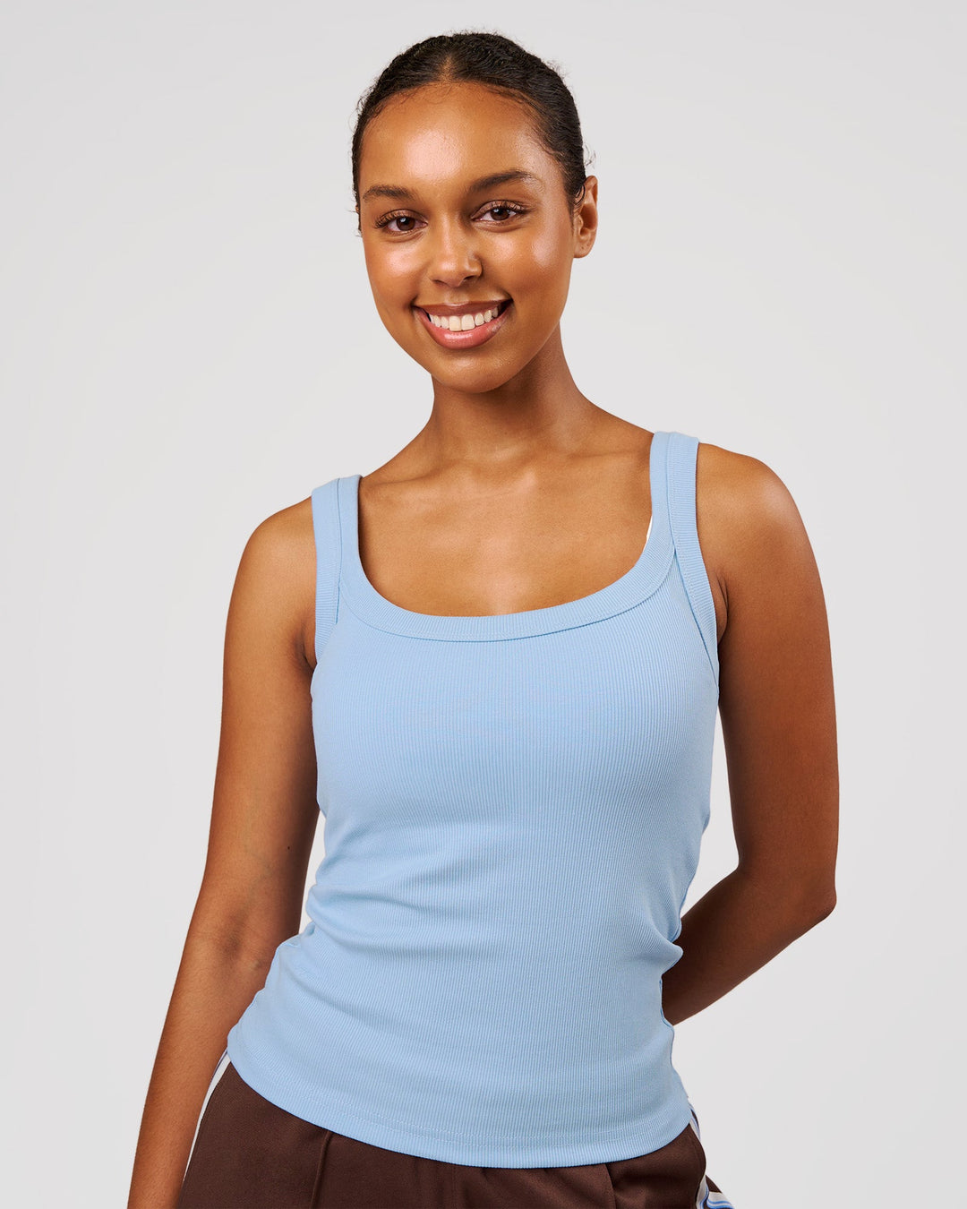 Woman wearing Go-To FLXCotton Rib Scoop Tank - Open Air | Model:Jordan | Size:XS - view 1