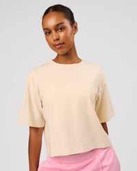 Woman wearing Go-To Heavyweight FlxCotton Skimmer Tee - Vanilla Bean-White | Model:Jordan | Size:XS | Thumbnail Index: 0