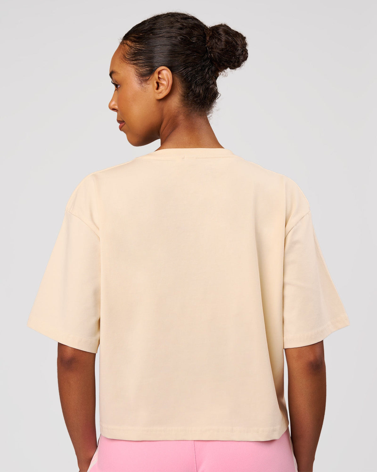Woman wearing Go-To Heavyweight FlxCotton Skimmer Tee - Vanilla Bean-White | Model:Jordan | Size:XS