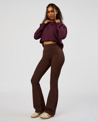 Woman wearing Go-To Long Sleeve FLXCotton Oversized Tee - Cherry Lacquer-White | Model:Jordan | Size:XS | Thumbnail Index: 3