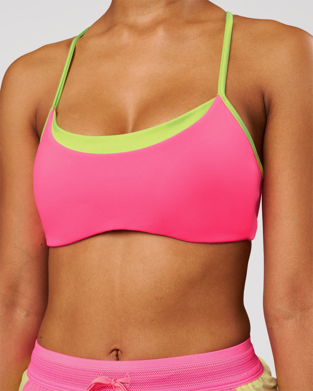 Woman wearing Tempo Sports Bra - Sugar Plum-Lime Glo | Model:Jordan | Size:XS - view 4