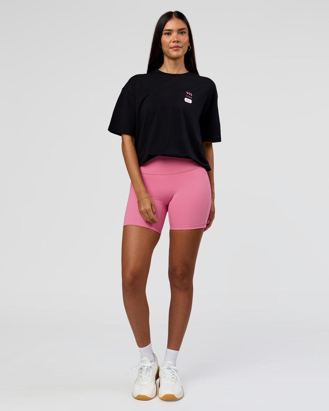 Woman wearing Archive FLXCotton Oversized Tee - Black-Candy Pink | Model:Rhiley | Size:XS - view 6