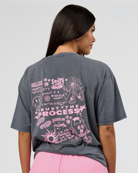 Woman wearing Built On Values FLXCotton Oversized Tee - Dark Storm Washed-Pink Rose | Model:Rhiley | Size:XS | Thumbnail Index: 1