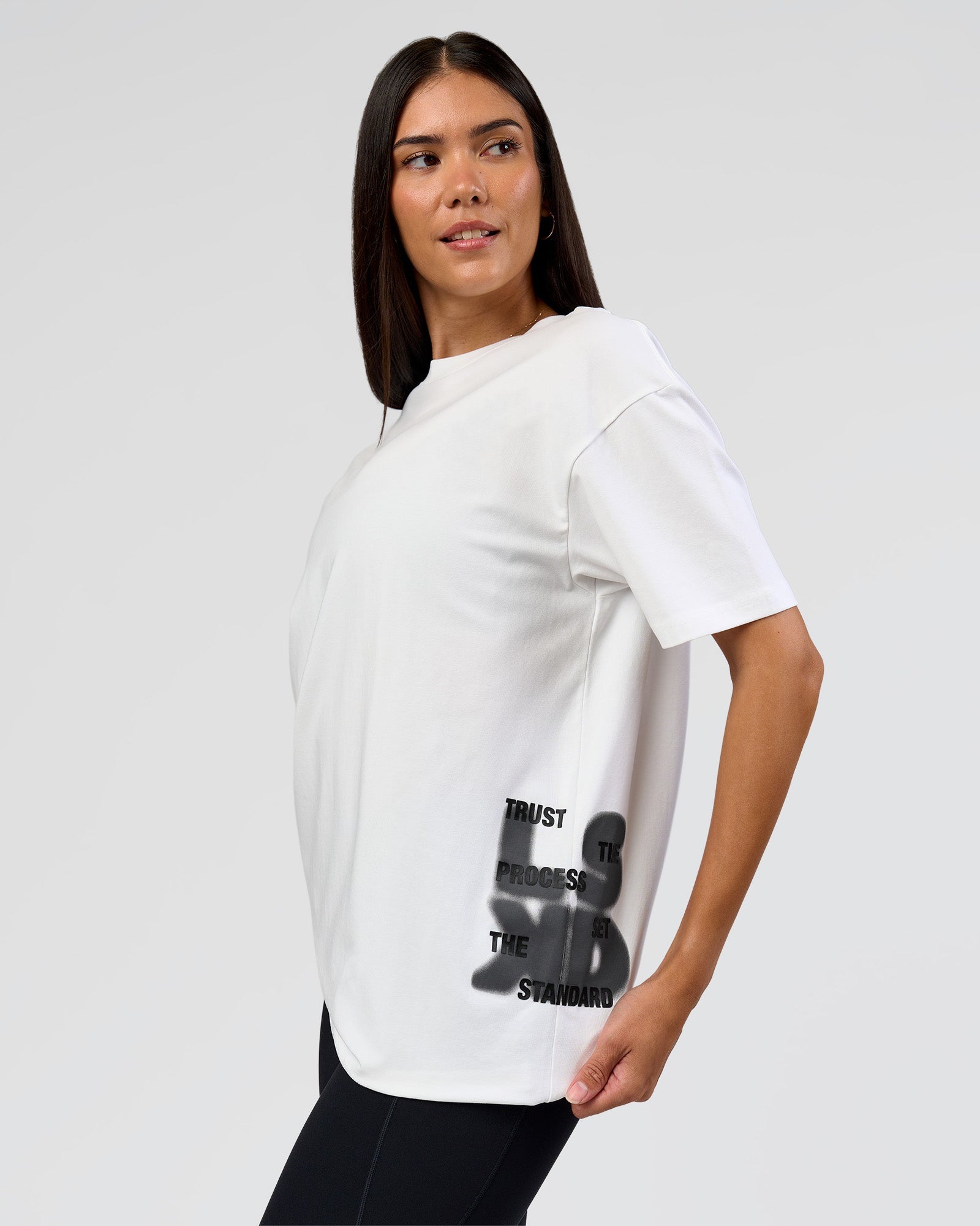 Woman wearing Clear Vision Heavyweight FLXCotton Oversized Tee - White-Black | Model:Rhiley | Size:XS