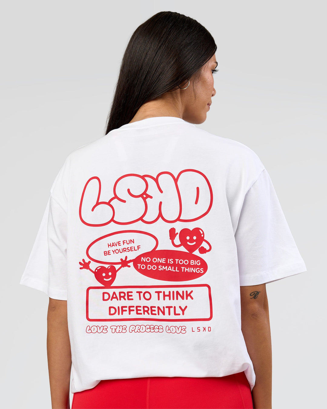 Woman wearing Dare To Think FLXCotton Tee Oversize - White-Scarlet | Model:Rhiley | Size:XS - view 4