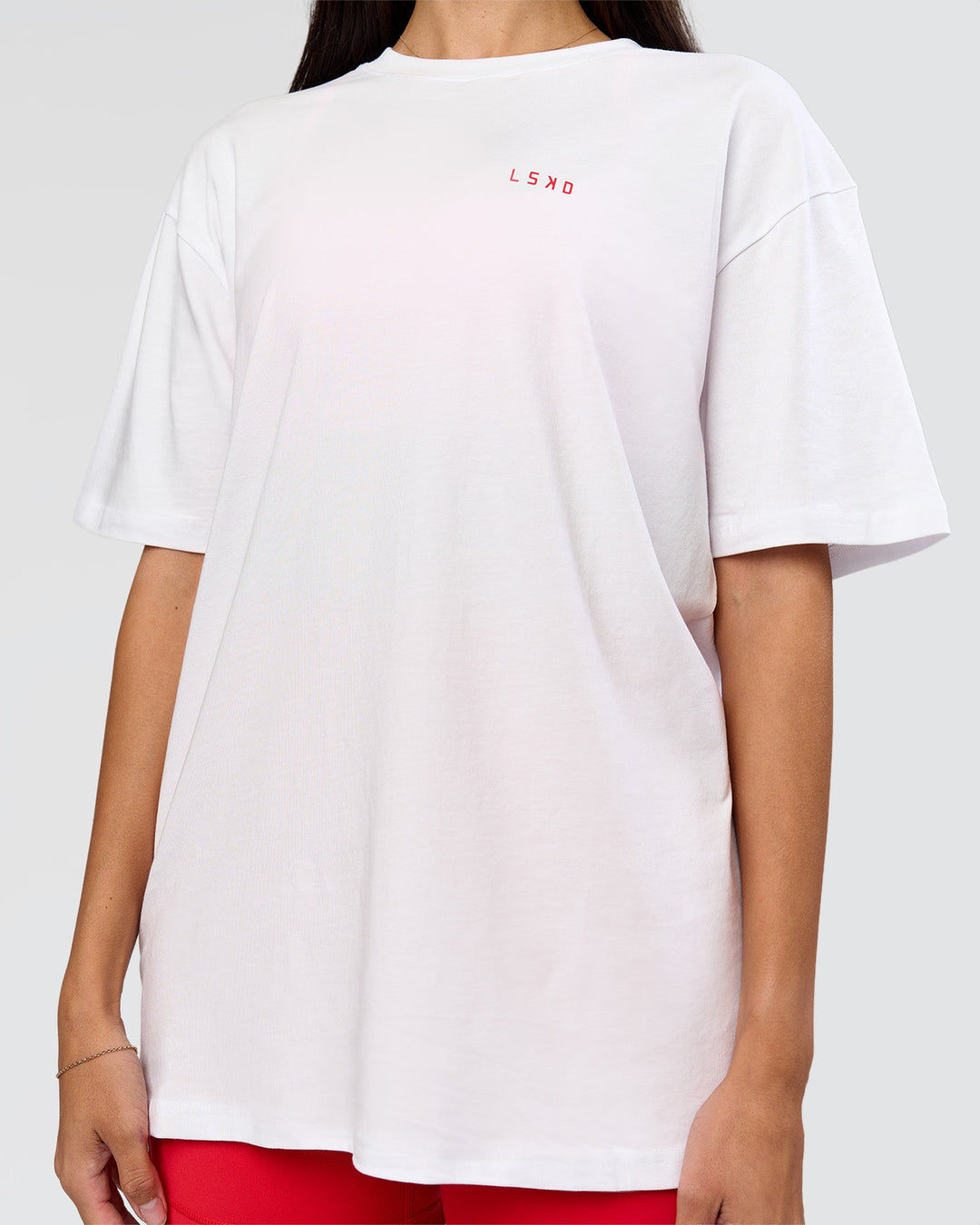 Woman wearing Dare To Think FLXCotton Tee Oversize - White-Scarlet | Model:Rhiley | Size:XS - view 6