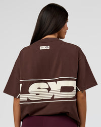 Woman wearing Inline Heavyweight FLXCotton Oversized Tee - Hot Chocolate-Off White | Model:Rhiley | Size:XS | Thumbnail Index: 2