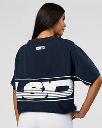 Woman wearing Inline Heavyweight FLXCotton Oversized Tee - Midnight Navy-White | Model:Rhiley | Size:XS | Thumbnail Index: 2