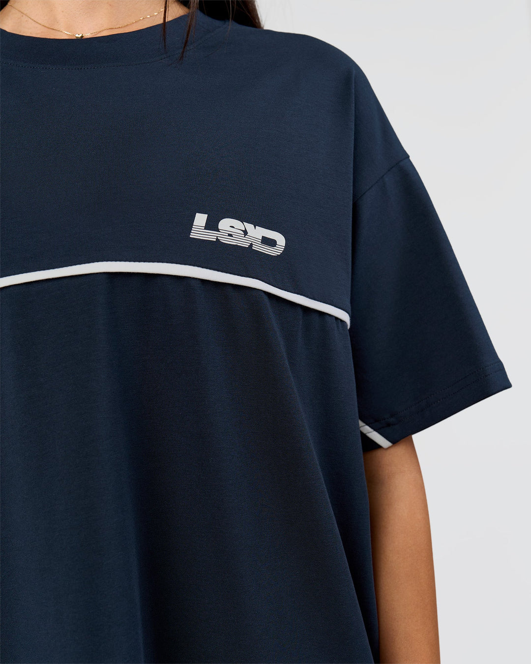 Woman wearing Inline Heavyweight FLXCotton Oversized Tee - Midnight Navy-White | Model:Rhiley | Size:XS - view 10