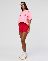 Woman wearing Inline Heavyweight FLXCotton Oversized Tee - Pink Rose-Flame | Model:Rhiley | Size:XS | Thumbnail Index: 14