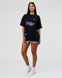 Woman wearing League Heavyweight FLXCotton Oversized Tee - Black-Power Cobalt | Model:Rhiley | Size:XS | Thumbnail Index: 12