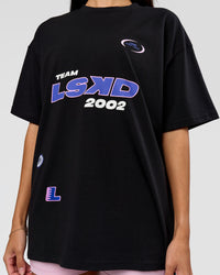 Woman wearing League Heavyweight FLXCotton Oversized Tee - Black-Power Cobalt | Model:Rhiley | Size:XS | Thumbnail Index: 3