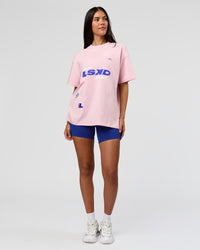 Woman wearing League Heavyweight FLXCotton Oversized Tee - Marshmallow-Power Cobalt | Model:Rhiley | Size:XS | Thumbnail Index: 4