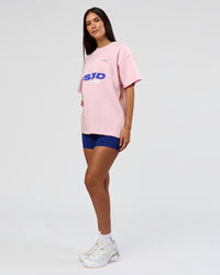 Woman wearing League Heavyweight FLXCotton Oversized Tee - Marshmallow-Power Cobalt | Model:Rhiley | Size:XS | Thumbnail Index: 8