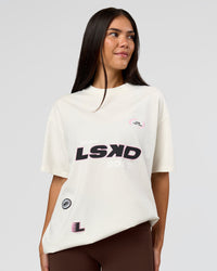 Woman wearing League Heavyweight FLXCotton Oversized Tee - Off White-Ground Coffee | Model:Rhiley | Size:XS | Thumbnail Index: 10