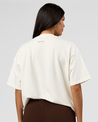 Woman wearing League Heavyweight FLXCotton Oversized Tee - Off White-Ground Coffee | Model:Rhiley | Size:XS | Thumbnail Index: 14