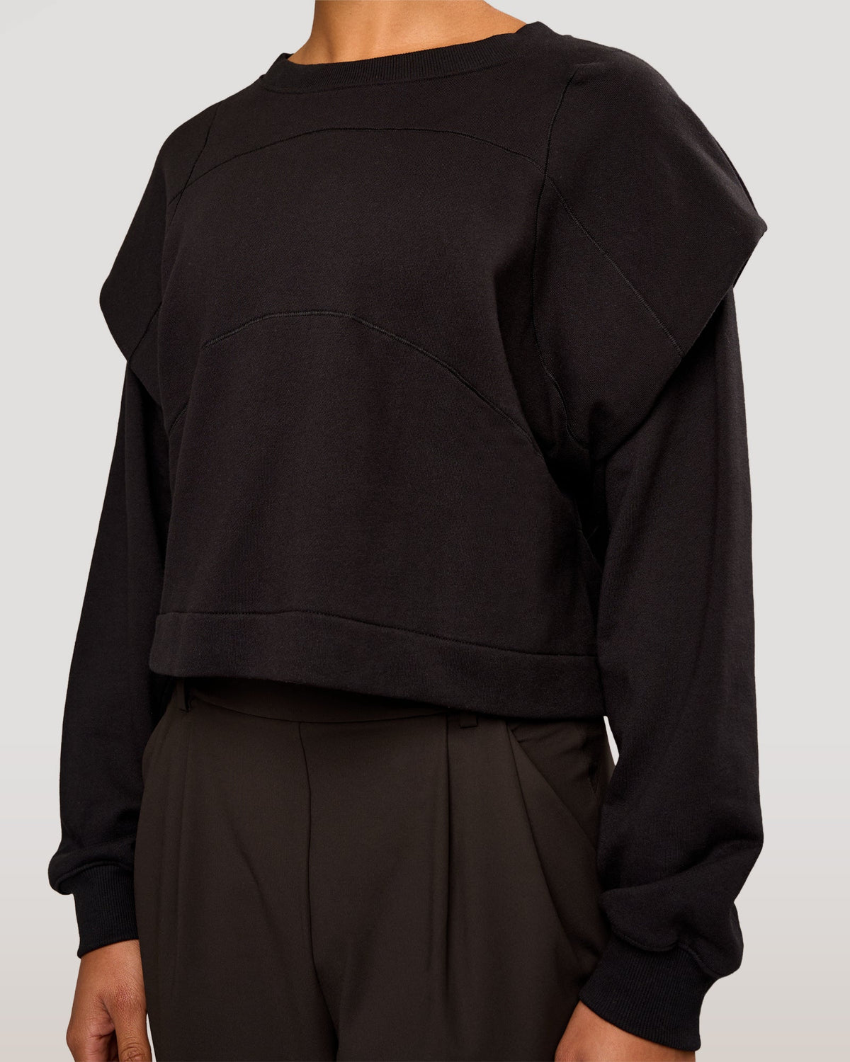 Woman wearing Bend Pleated Shoulder Oversized Sweat - Black | Model:Rosie | Size:XS