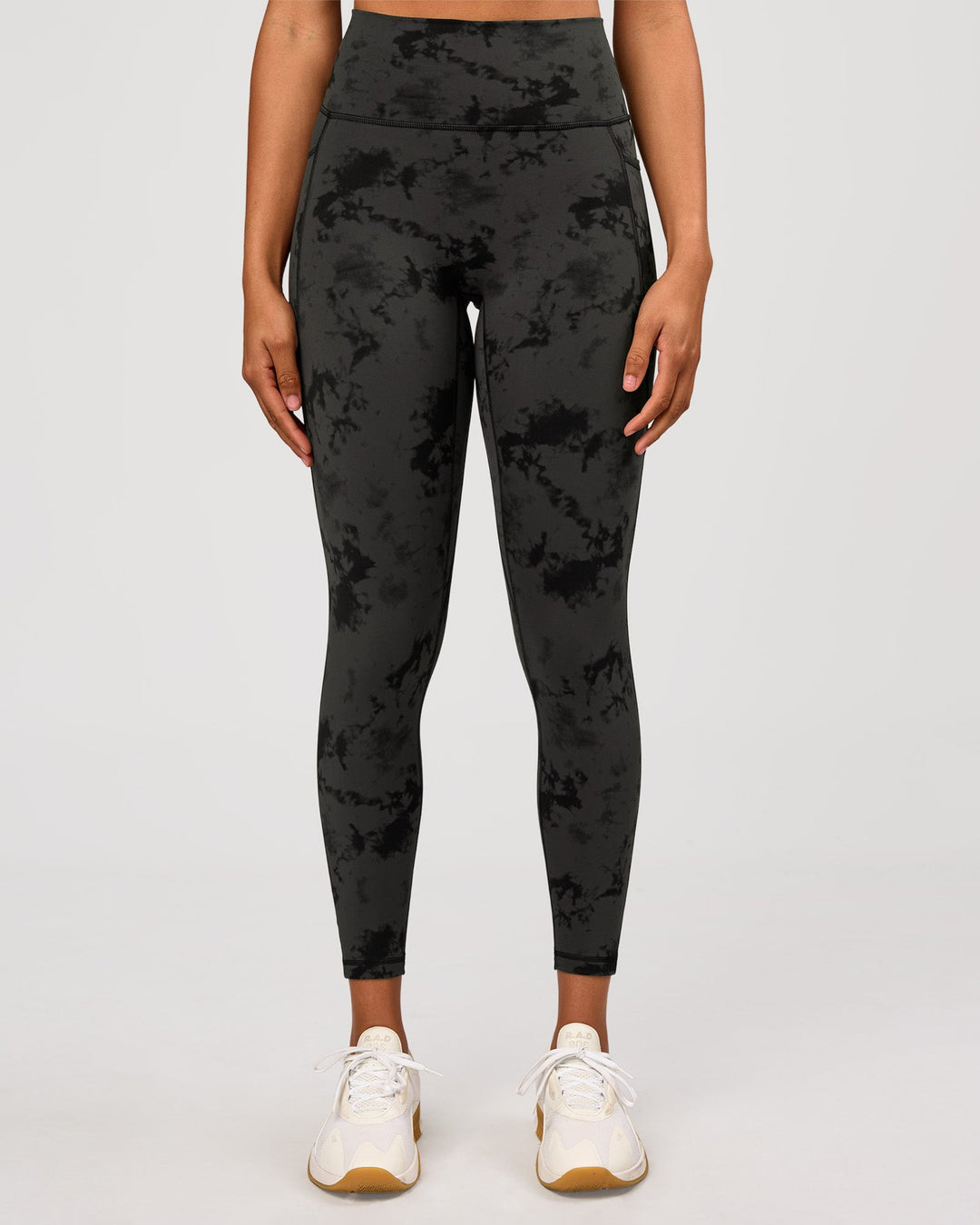 Woman wearing Fusion Ultra High-Rise 7/8 Legging Pockets - Obsidian/Black Tye Dye | Model:Rosie | Size:XS - view 2
