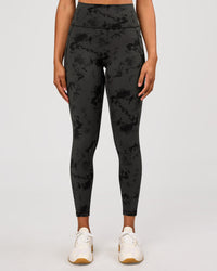 Woman wearing Fusion Ultra High-Rise 7/8 Legging Pockets - Obsidian/Black Tye Dye | Model:Rosie | Size:XS | Thumbnail Index: 1