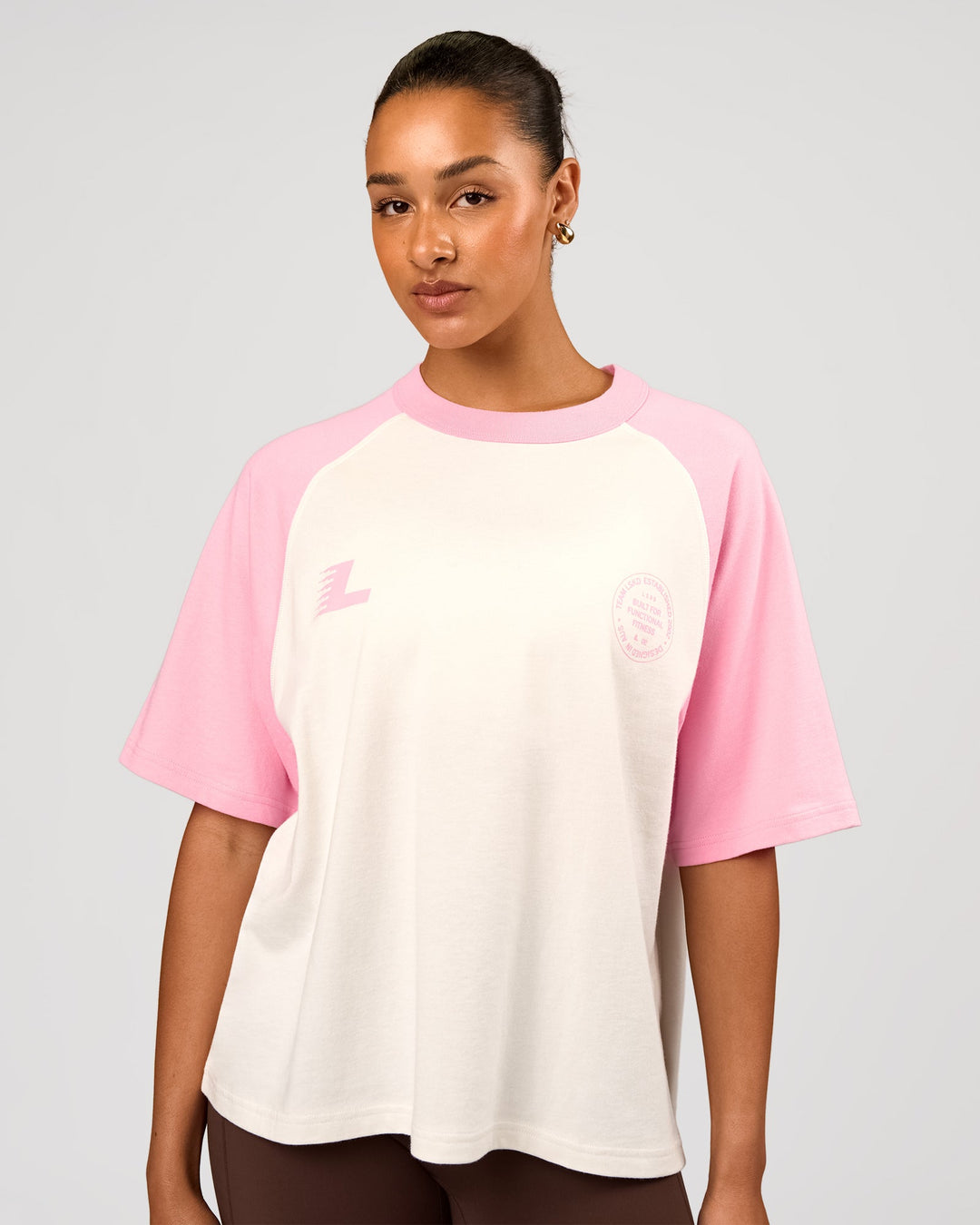 Woman wearing Victory Heavyweight Boxed Raglan Tee - Off White-Pink Rose | Model:Rosie | Size:XS - view 3