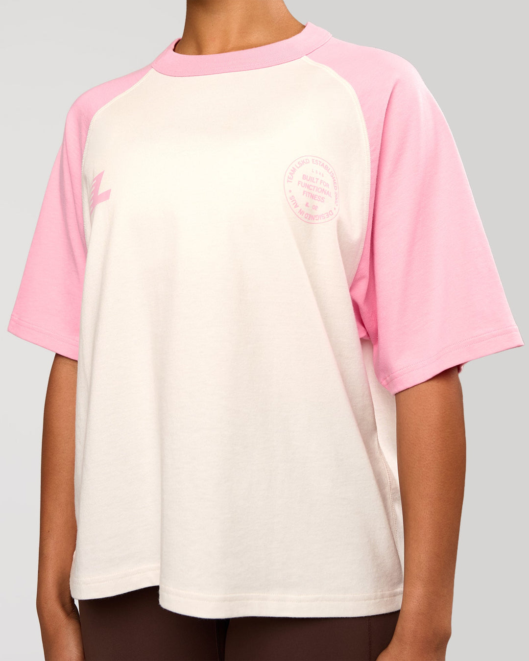 Woman wearing Victory Heavyweight Boxed Raglan Tee - Off White-Pink Rose | Model:Rosie | Size:XS - view 6