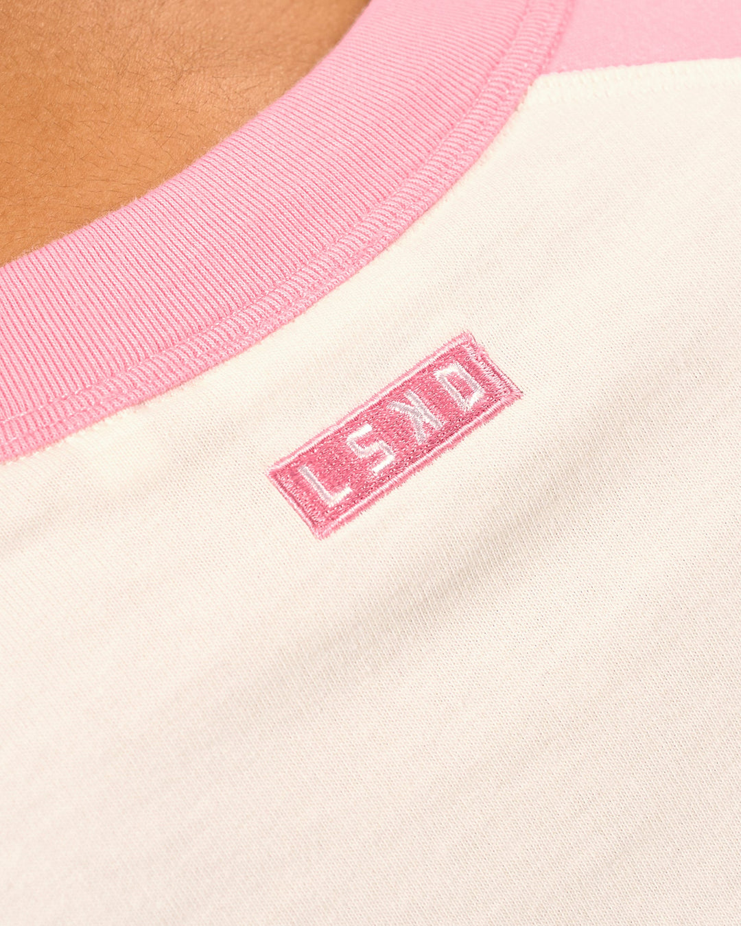 Woman wearing Victory Heavyweight Boxed Raglan Tee - Off White-Pink Rose | Model:Rosie | Size:XS - view 10
