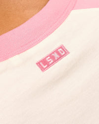 Woman wearing Victory Heavyweight Boxed Raglan Tee - Off White-Pink Rose | Model:Rosie | Size:XS | Thumbnail Index: 9
