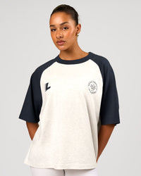 Woman wearing Victory Heavyweight Boxed Raglan Tee - Silver Marl-Midnight Navy | Model:Rosie | Size:XS | Thumbnail Index: 2