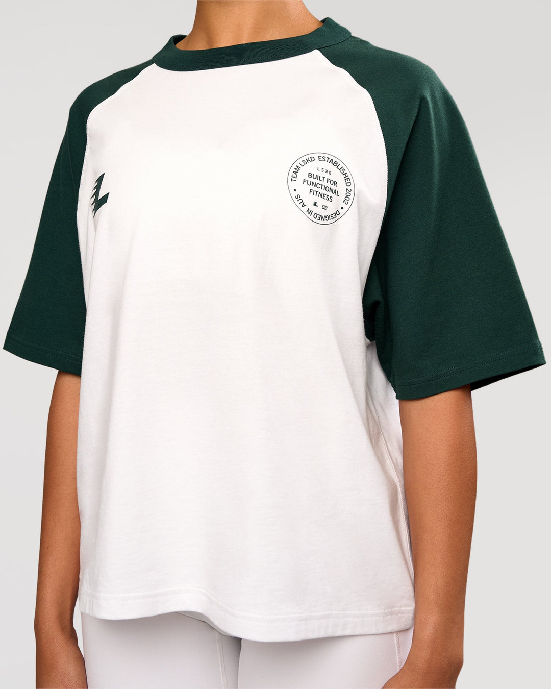 Woman wearing Victory Heavyweight Boxed Raglan Tee - White-Midnight Green | Model:Rosie | Size:XS - view 9